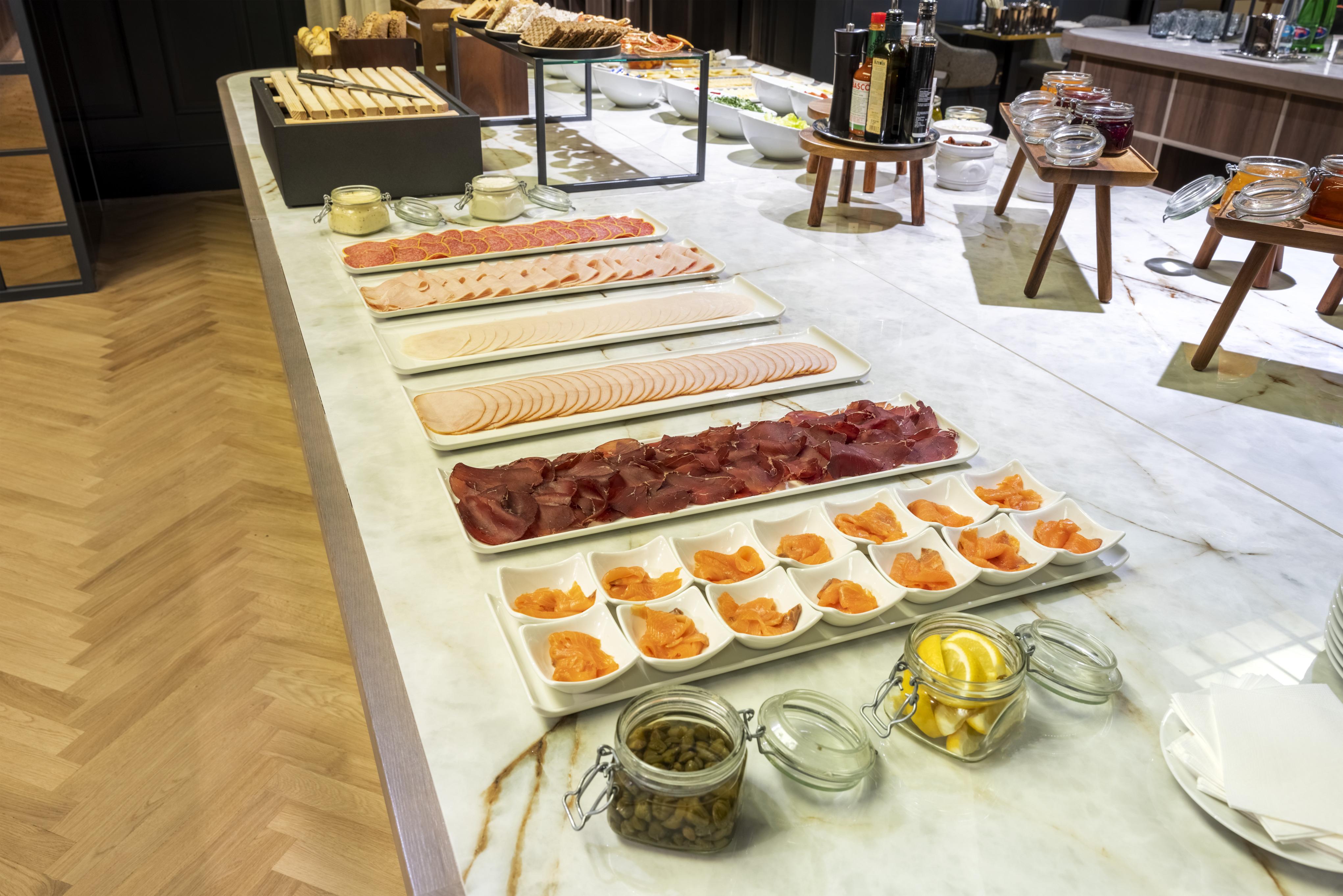Hotel Nh Collection Prague Carlo IV Extérieur photo A selection of cold cuts at a buffet