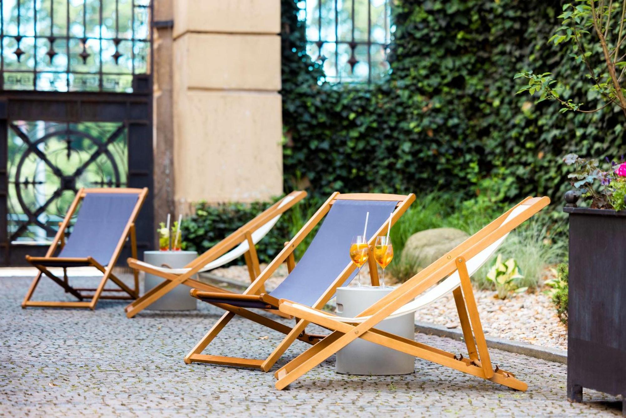 Hotel Nh Collection Prague Carlo IV Extérieur photo A pair of deck chairs